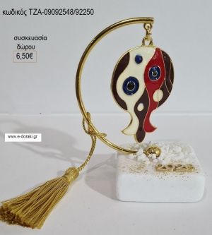 ρόδι κόκκινο μπλε σε ημικύκλιο πάνω σε βότσαλο